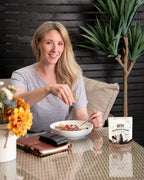 Lifestyle photo of Ghuttie Cacao Sunflower Seeds in an everyday setting