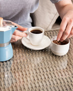Lifestyle photo showing Ghuttie Cacao Sunflower Seeds served as a snack