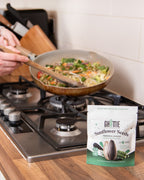 Lifestyle photo of Ghuttie Moringa Sunflower Seeds pouch in use