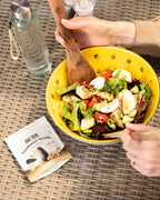 Lifestyle photo of Ghuttie Maca Sunflower Seeds pouch in use